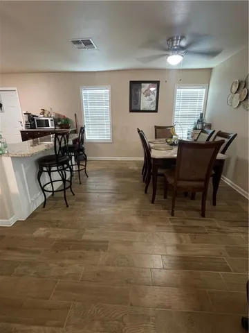 a view of a dining room with furniture