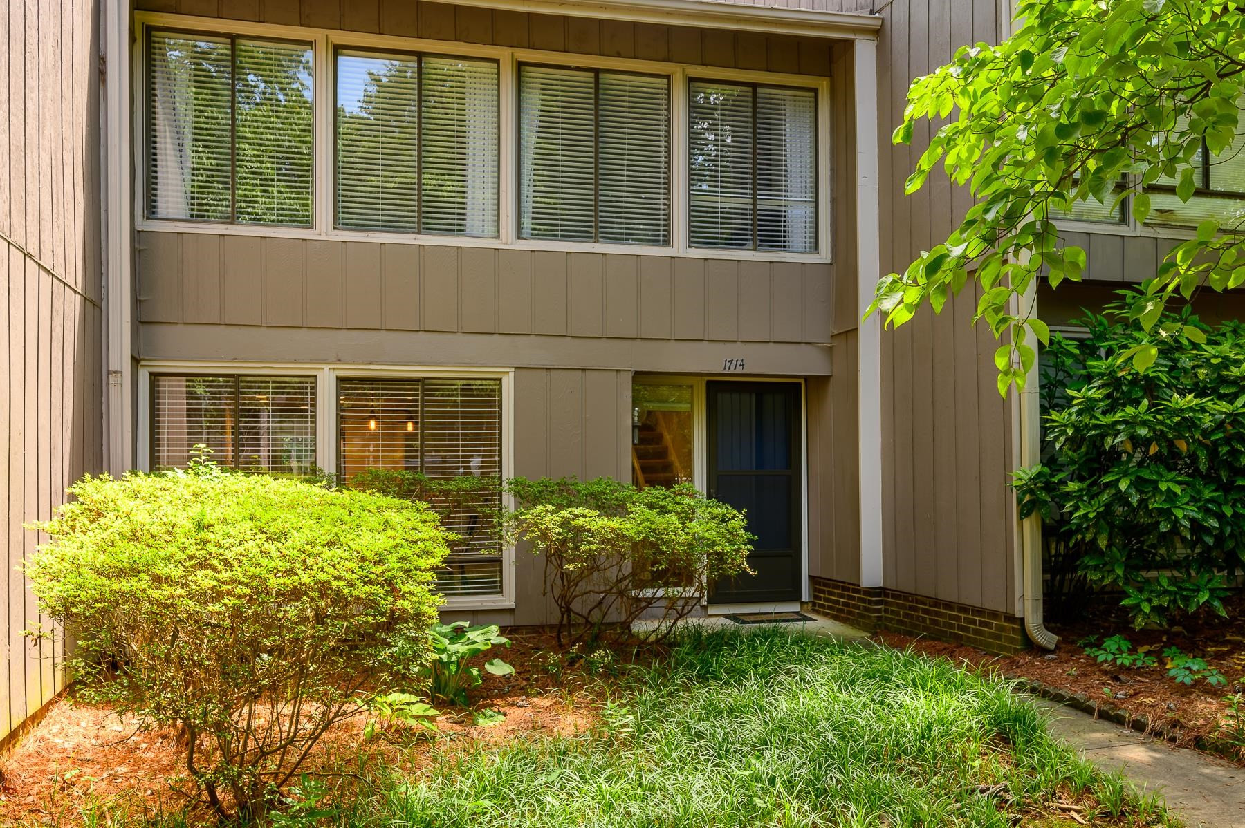 1714 Quail Ridge Road Raleigh, NC 27609 - Photo 2 of 25 front view of a house with a yard