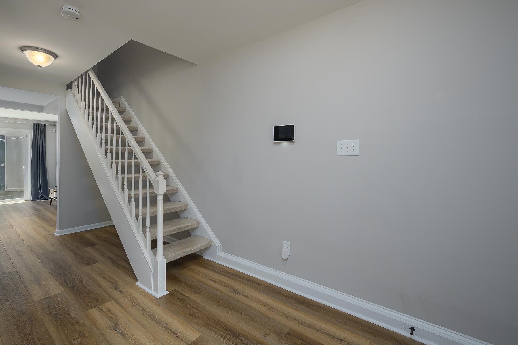 1714 Quail Ridge Road Raleigh, NC 27609 - Photo 3 of 25 a view of a hallway with staircase