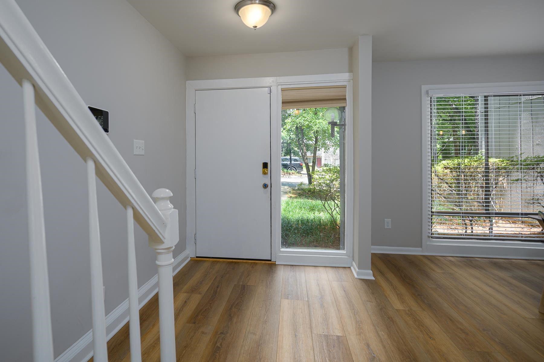 1714 Quail Ridge Road Raleigh, NC 27609 - Photo 4 of 25 a view of entryway and hall with wooden floor