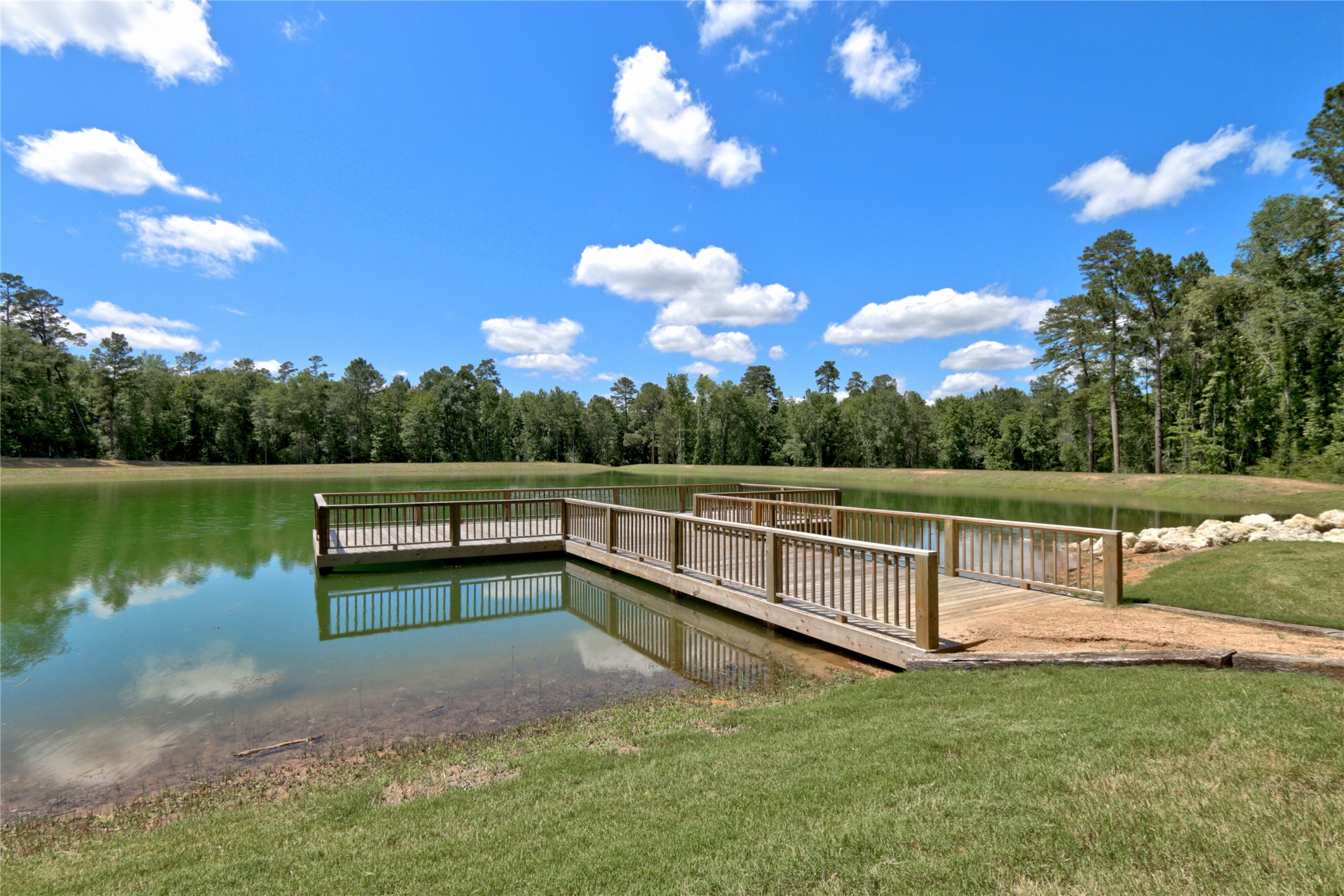 258 Heartland Road New Waverly, TX 77358 - Photo 22 of 27 Community Pond & Dock Areea