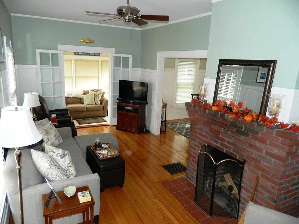 24 Birch Street Marblehead, MA 01945 - Photo 3 of 19 a living room with furniture and a flat screen tv
