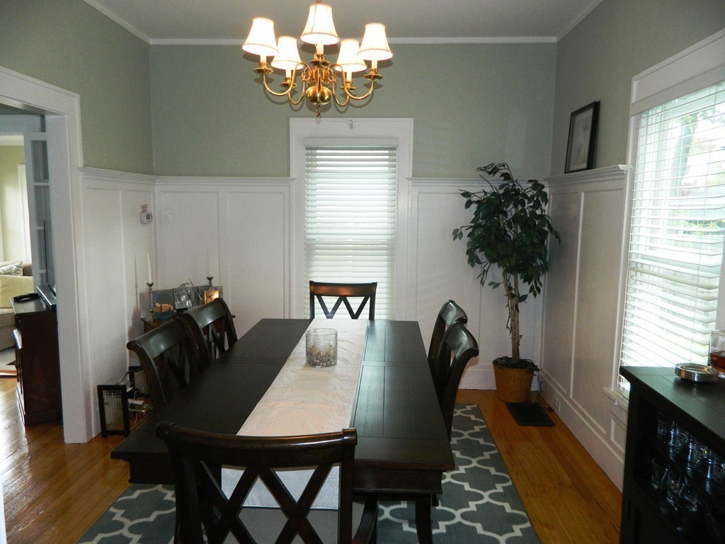 24 Birch Street Marblehead, MA 01945 - Photo 7 of 19 a view of a dining room with furniture and window