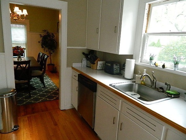 24 Birch Street Marblehead, MA 01945 - Photo 10 of 19 a kitchen with a sink and cabinets