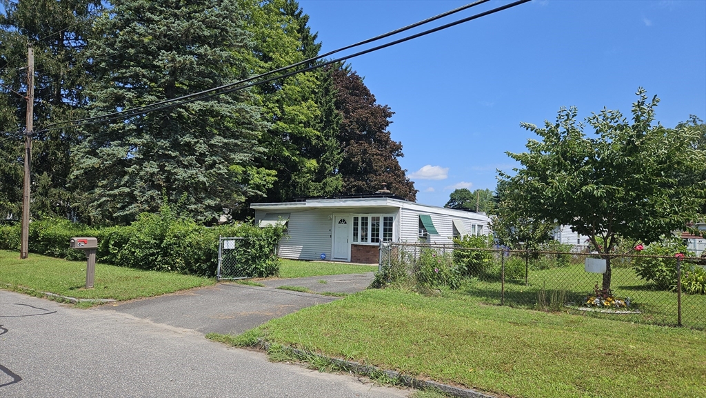 45 Wallace Street Springfield, MA 01119 - Photo 1 of 27 a view of house with a yard
