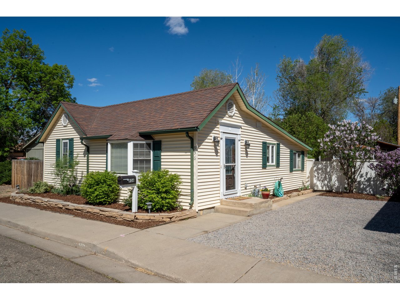 936 6th Street Berthoud, CO 80513 - Photo 1 of 22 a view of a house with a yard