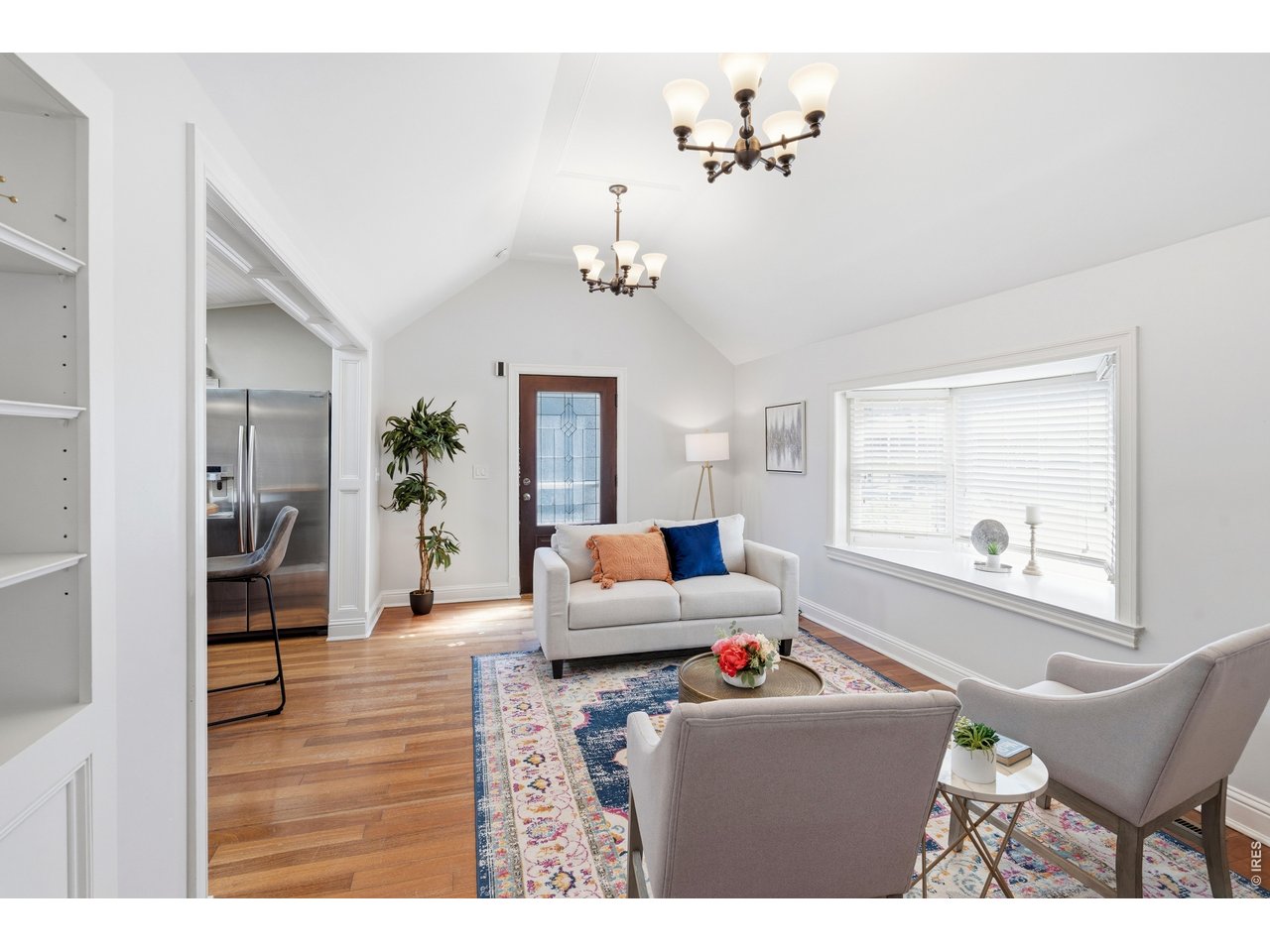 936 6th Street Berthoud, CO 80513 - Photo 5 of 22 a living room with furniture and a window