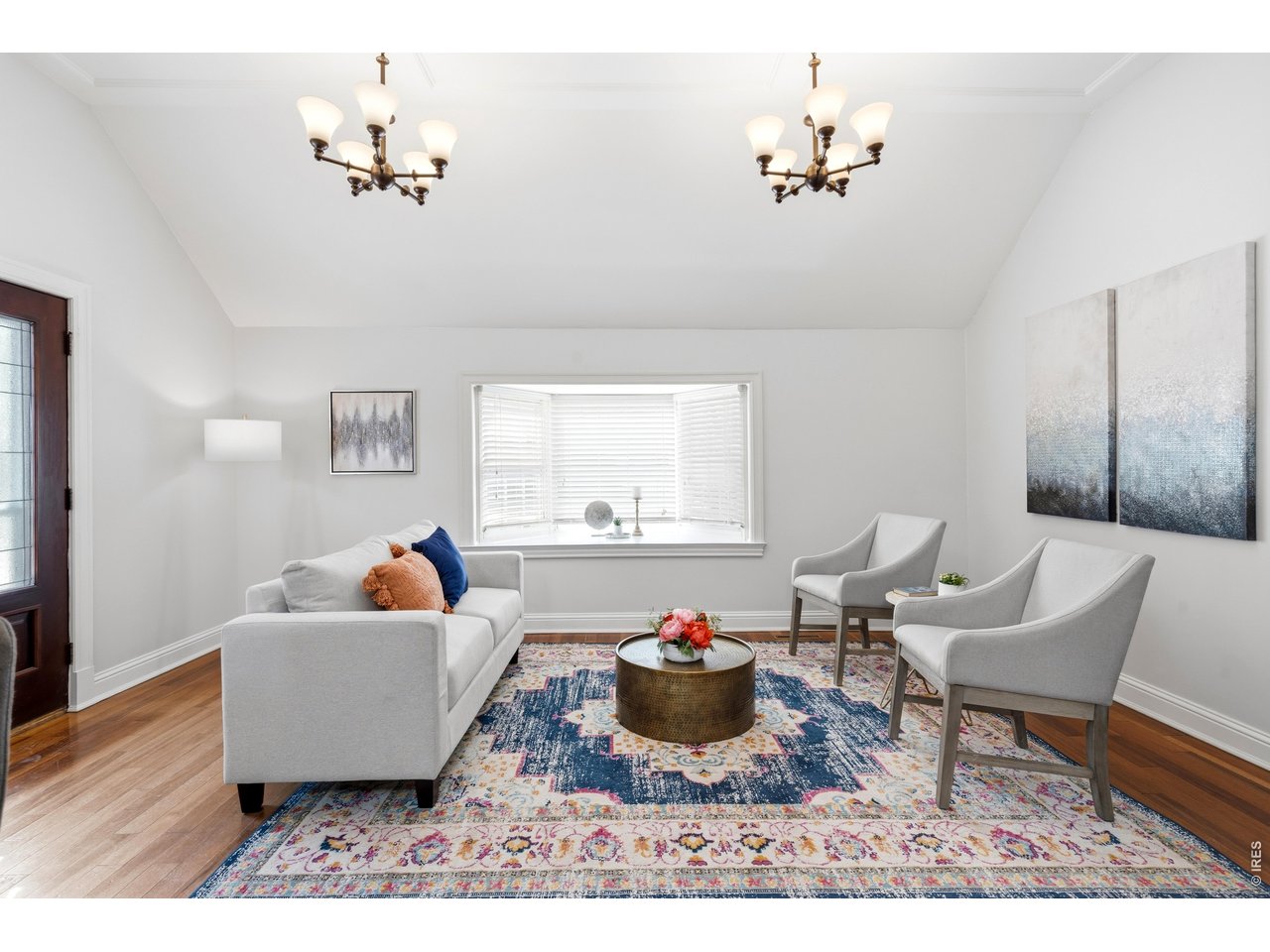 936 6th Street Berthoud, CO 80513 - Photo 6 of 22 a living room with furniture and a window