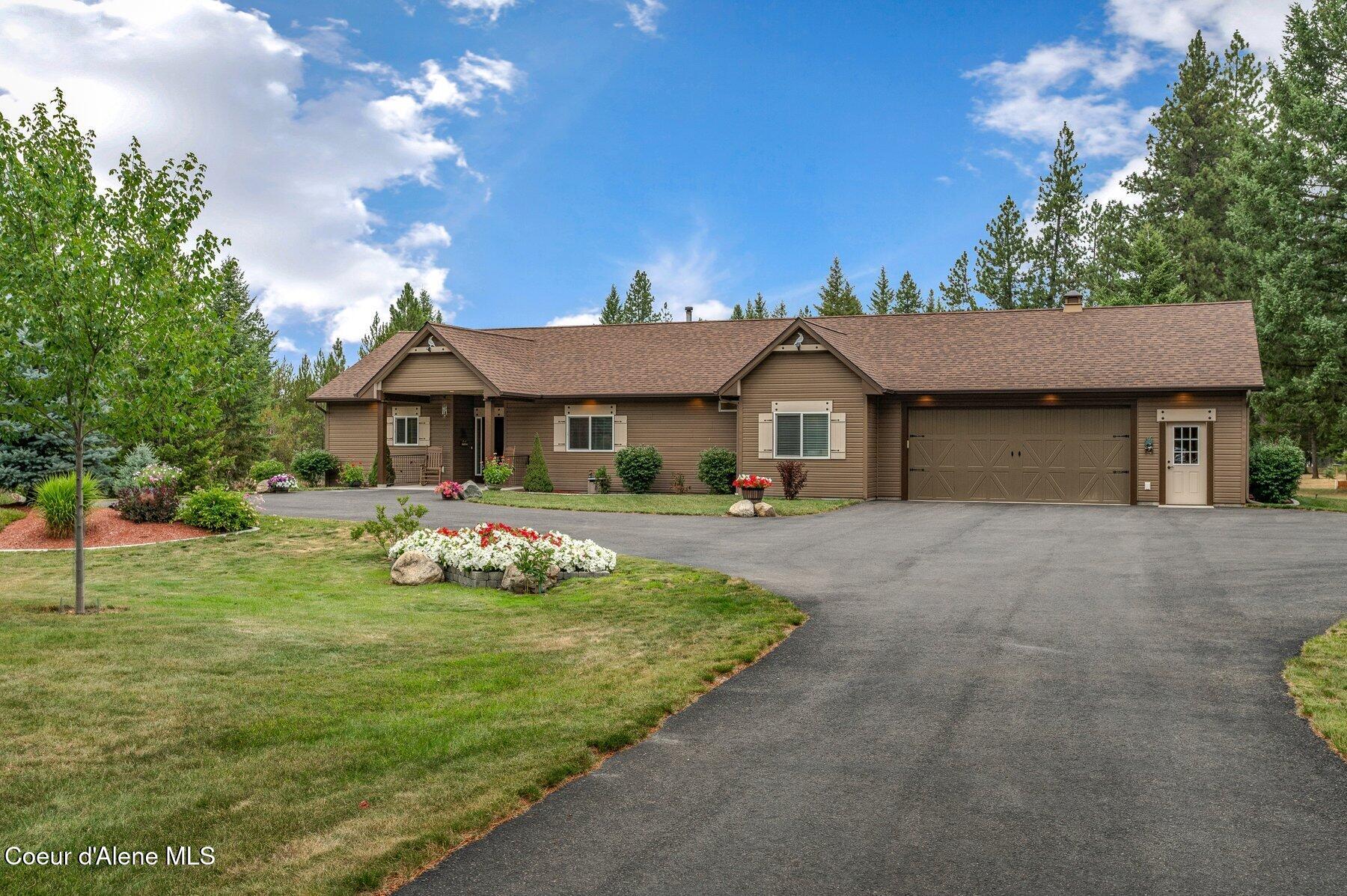975 West Ohio Match Road Rathdrum, ID 83858 - Photo 1 of 52 Beautifully Crafted Home
