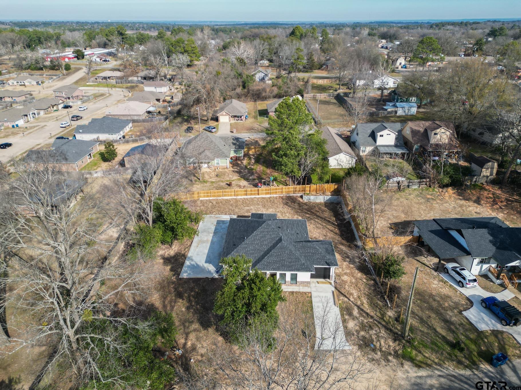 413 Stewart Street Lindale, TX 75771 - Photo 5 of 39 an aerial view of residential house with outdoor space