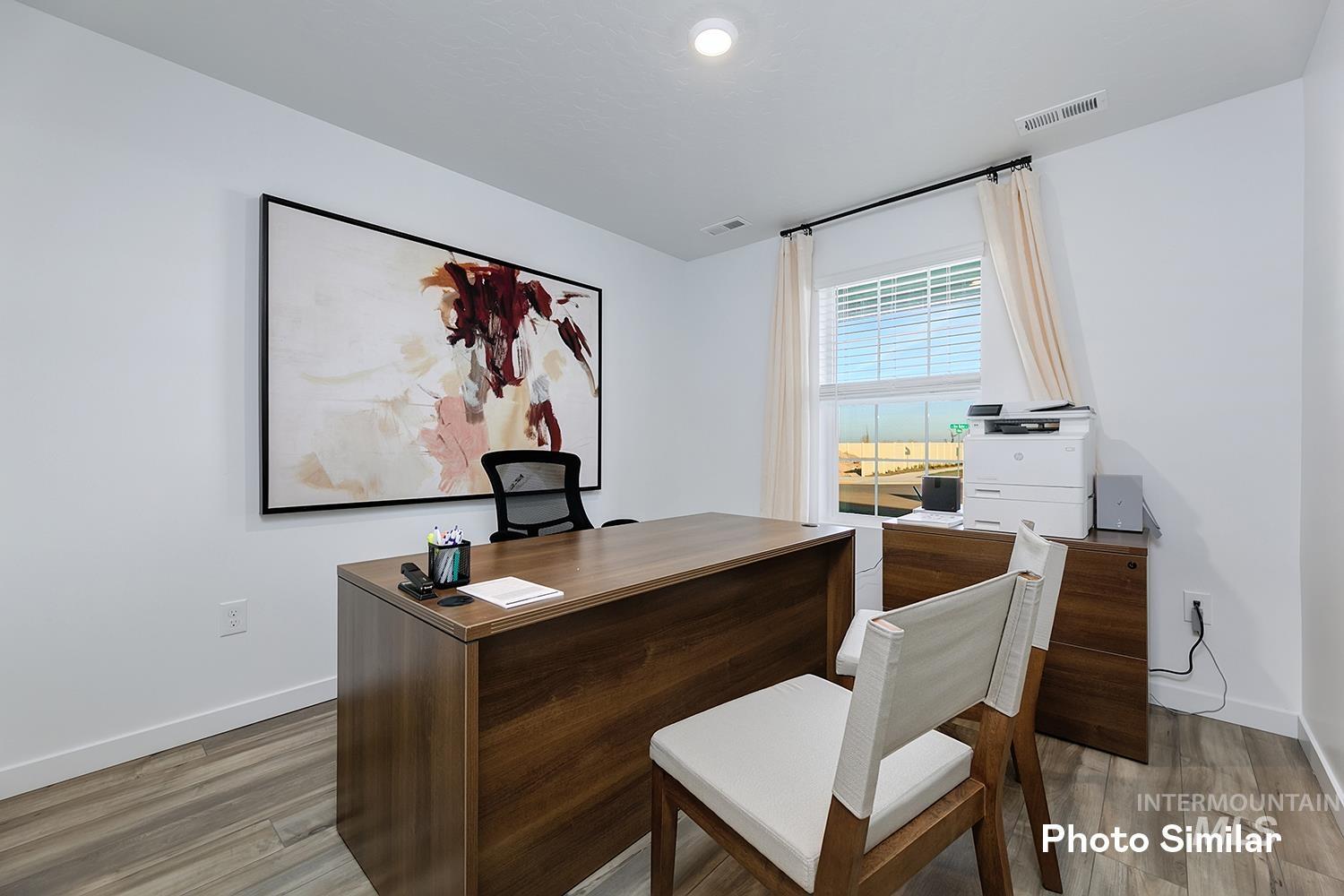 3045 North Kankakee Way Kuna, ID 83634 - Photo 11 of 19 Office featuring light wood-style flooring and baseboards