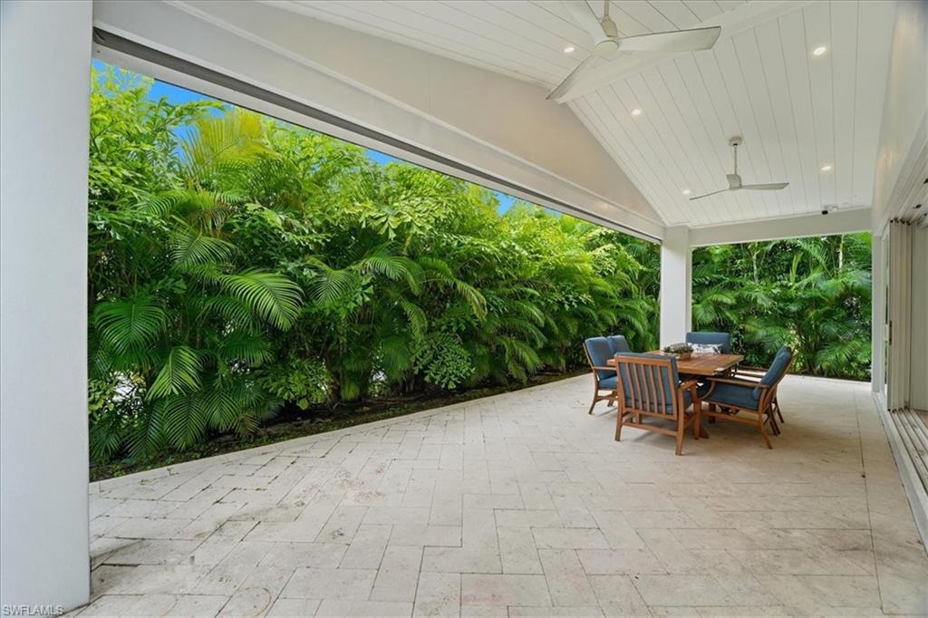 5130 Alpha Court Naples, FL 34105 - Photo 19 of 49 a outdoor space with furniture