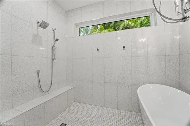 a bathroom with a white tub