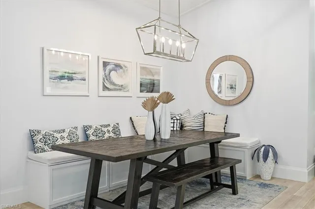 a view of a dining room with furniture