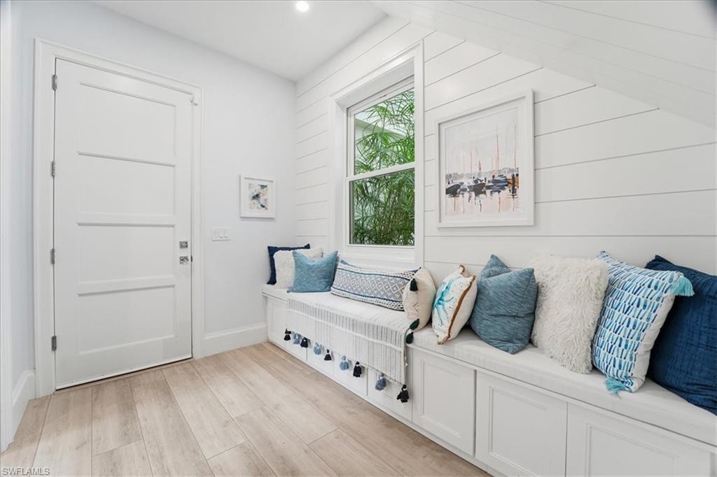 5130 Alpha Court Naples, FL 34105 - Photo 31 of 49 a living room with furniture and a large window