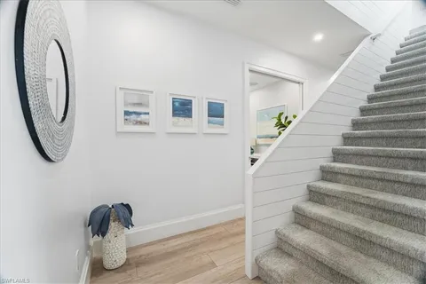 a view of entryway with wooden floor