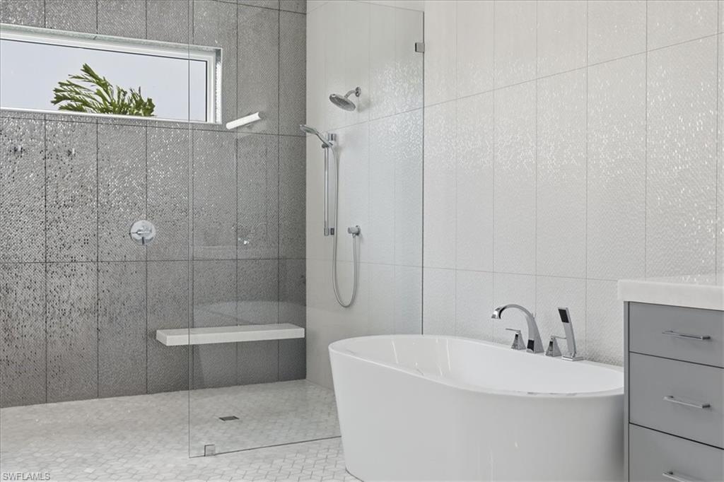 5130 Alpha Court Naples, FL 34105 - Photo 42 of 49 a bathroom with a sink a toilet and shower