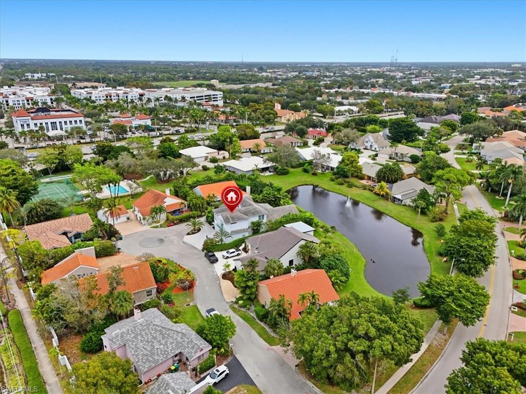 5130 Alpha Court Naples, FL 34105 - Photo 47 of 49 an aerial view of residential houses with outdoor space and trees