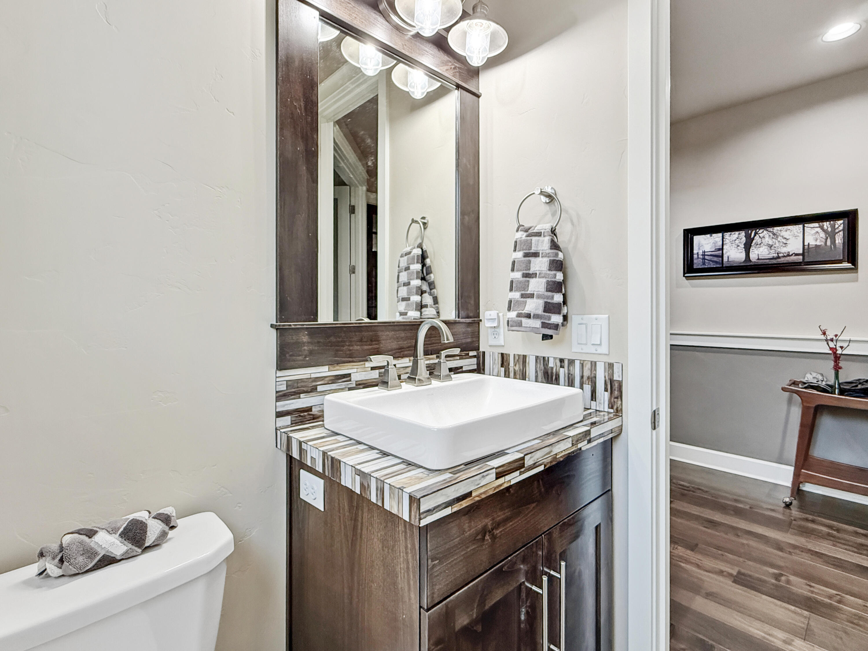 61072 Manhae Loop Bend, OR 97702 - Photo 16 of 63 a bathroom with a sink and a mirror