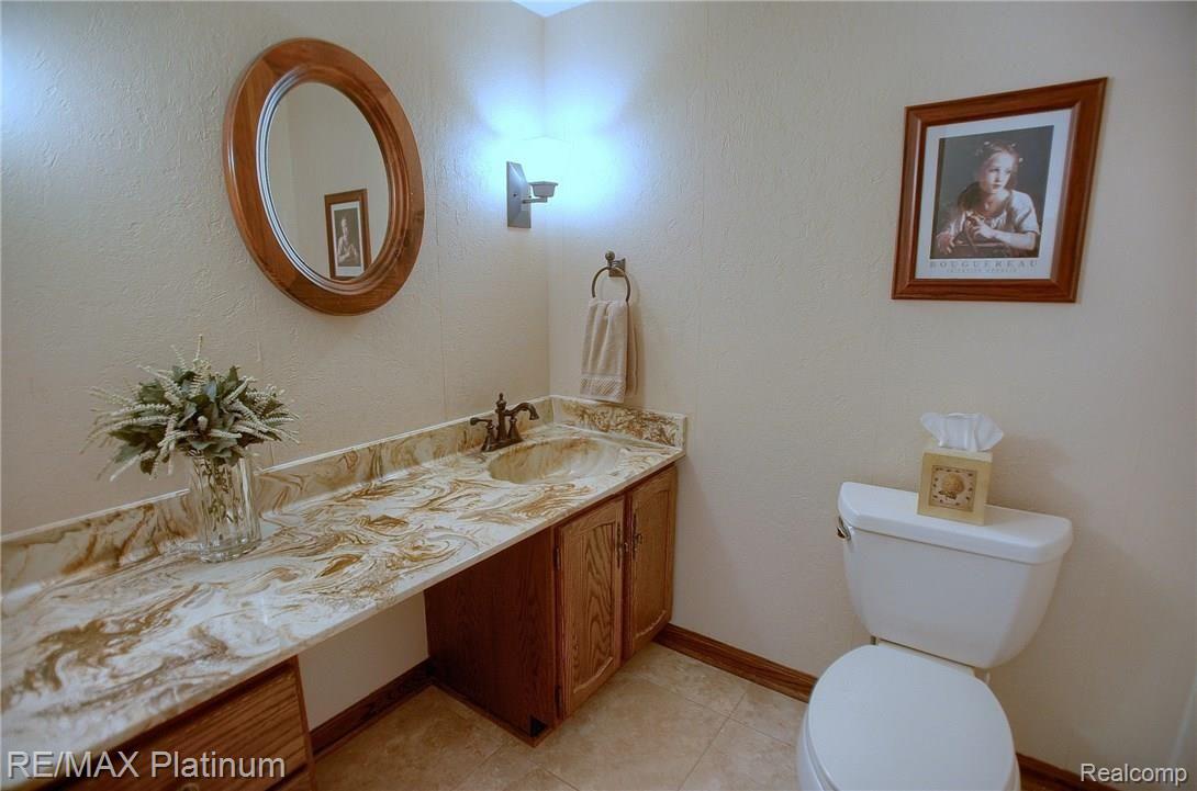 534 Newton Road Brighton, MI 48114 - Photo 28 of 42 1ST FLOOR HALF BATH