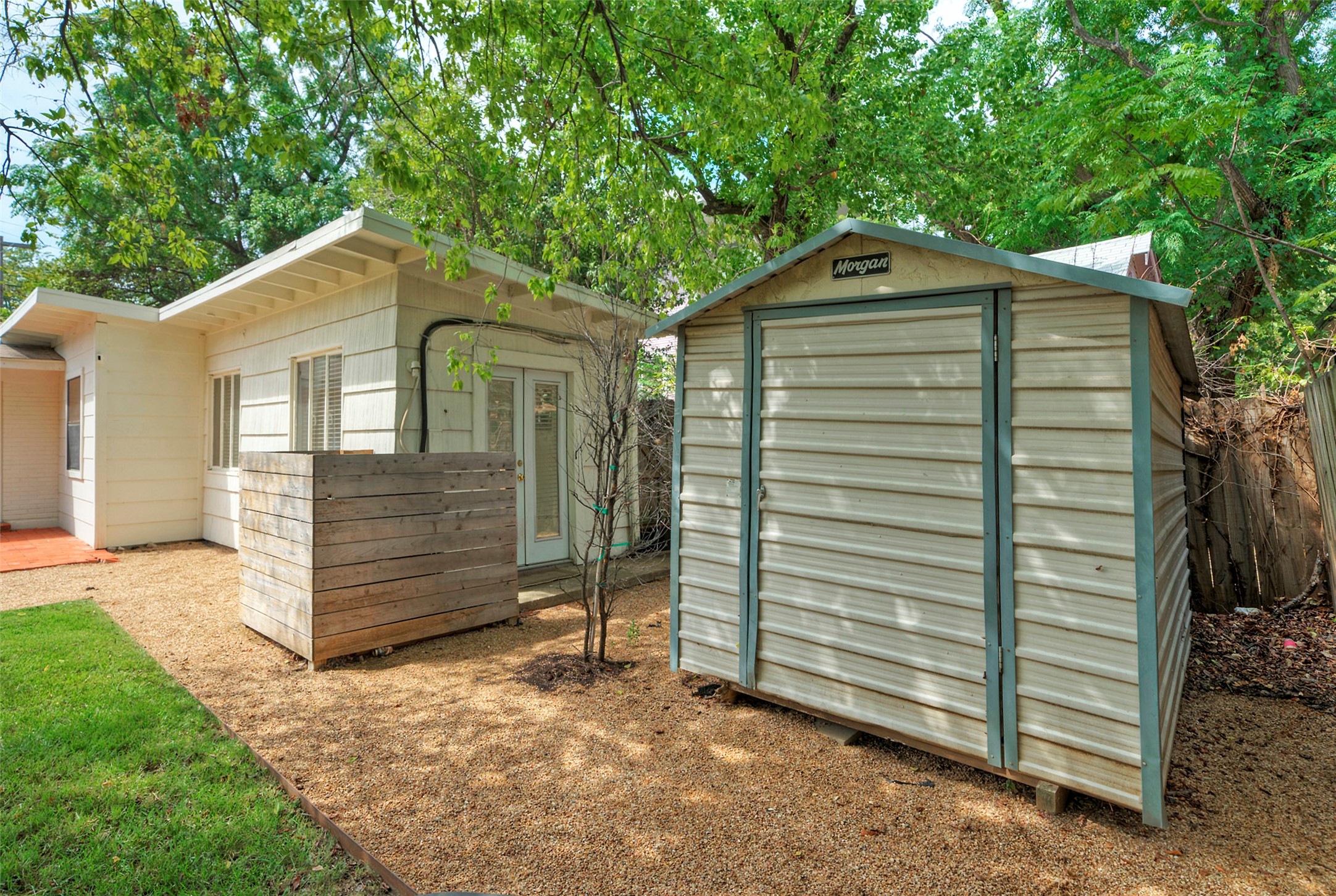 1803 Pearl Street Austin, TX 78701 - Photo 29 of 33 a front view of a house with a yard