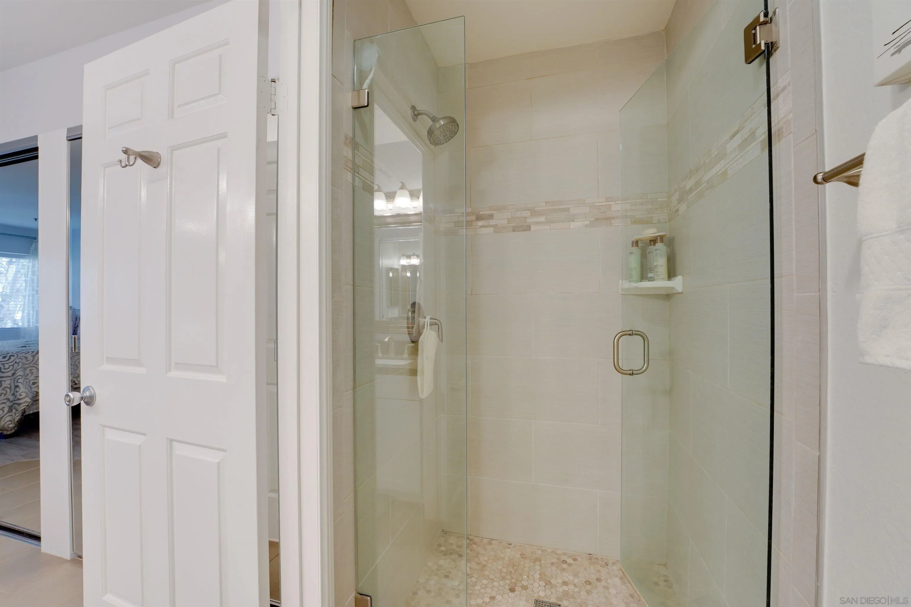 5745 Friars Road, Unit 107 San Diego, CA 92110 - Photo 14 of 25 a bathroom with a shower