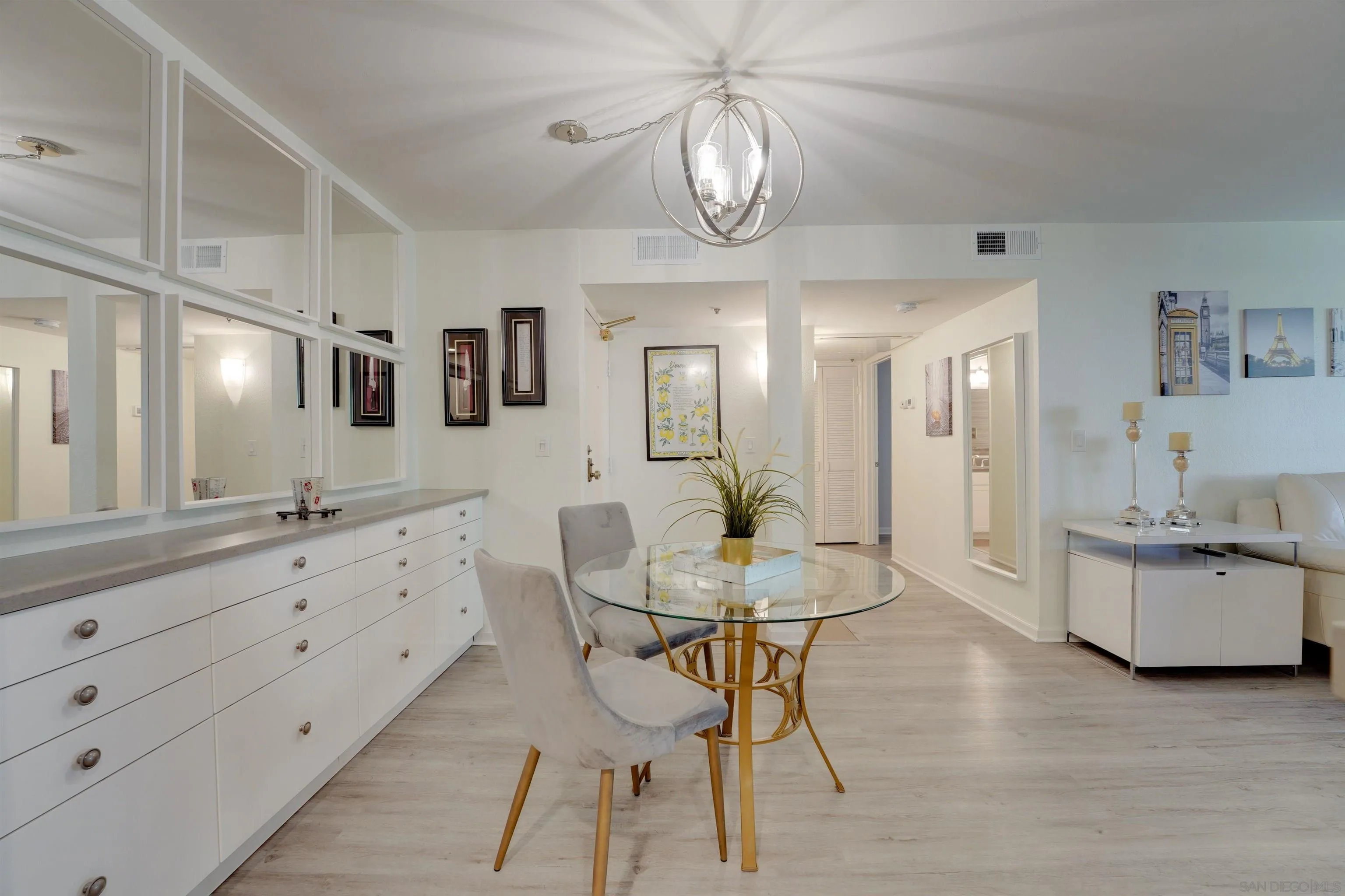 5745 Friars Road, Unit 107 San Diego, CA 92110 - Photo 6 of 25 a view of dining table chairs and window