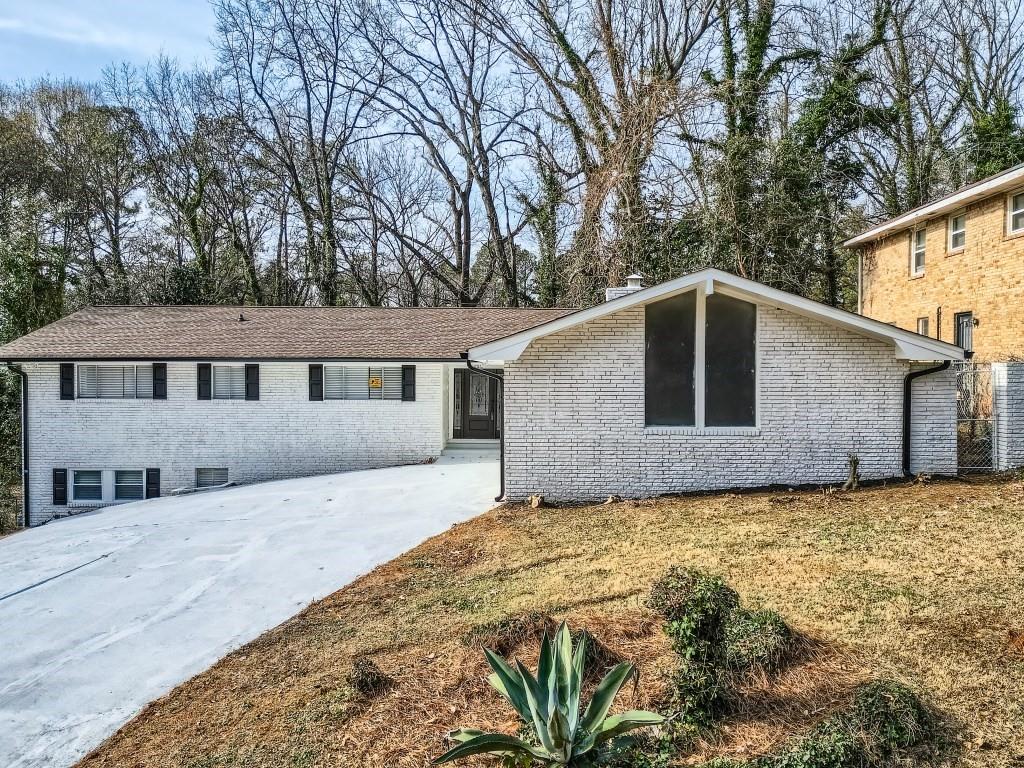 2697 Rainbow Ridge Road Decatur, GA 30034 - Photo 1 of 1 a front view of a house with a yard