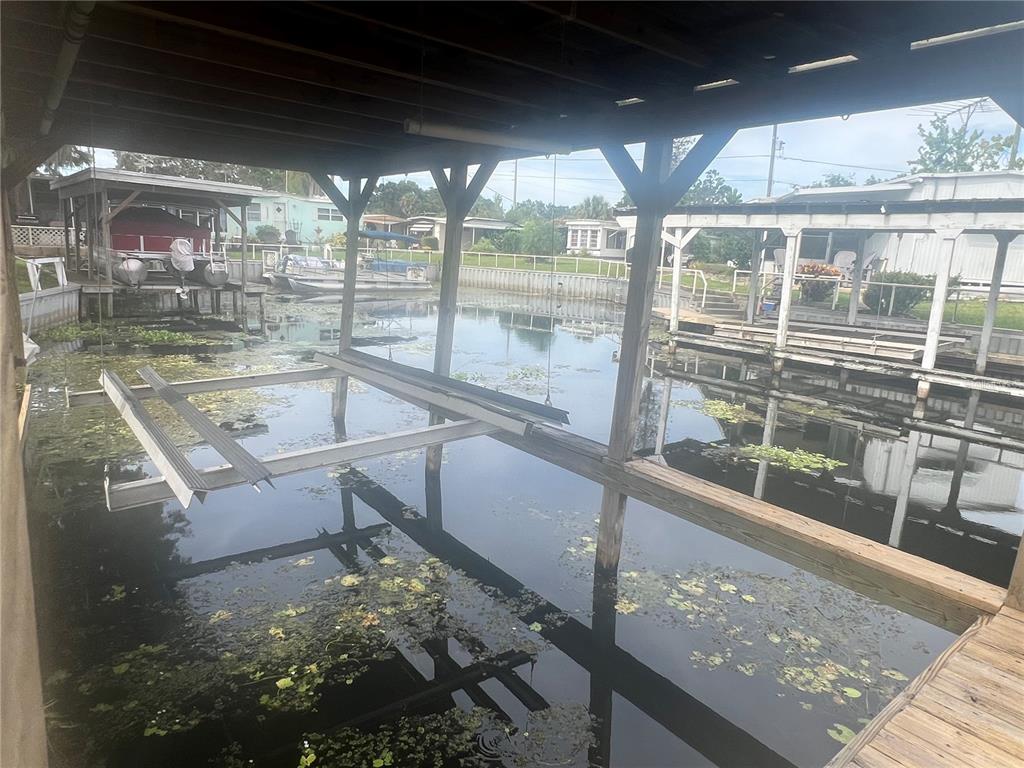 240 Rue De Fontaine Tavares, FL 32778 - Photo 11 of 43 a view of a living room and floor to ceiling window or kitchen