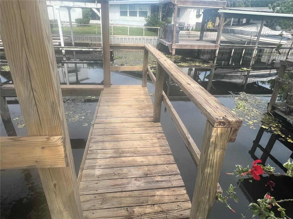 240 Rue De Fontaine Tavares, FL 32778 - Photo 12 of 43 a bathroom with a sink and mirror