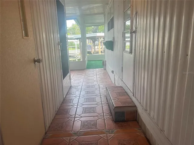 a view of a house with backyard