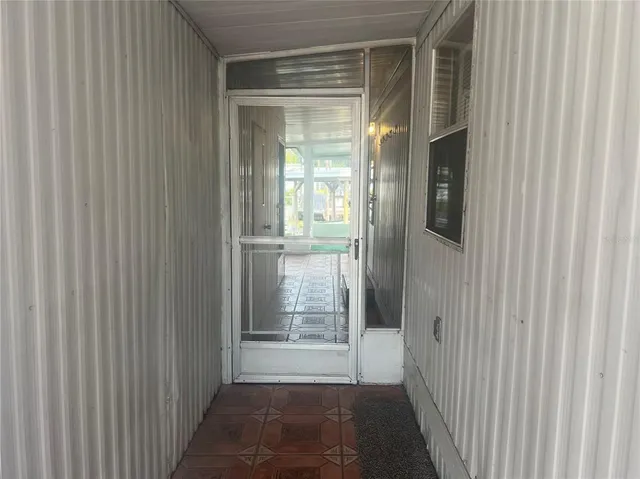 a view of backyard with tub