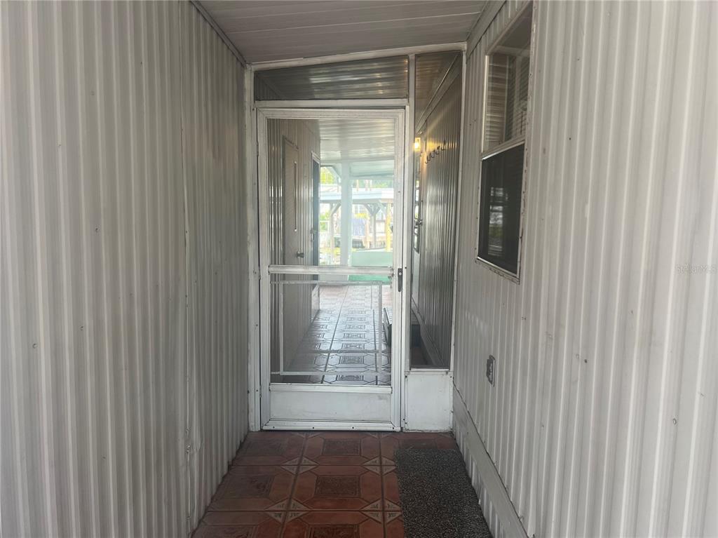 240 Rue De Fontaine Tavares, FL 32778 - Photo 14 of 43 a view of a room that has a large window