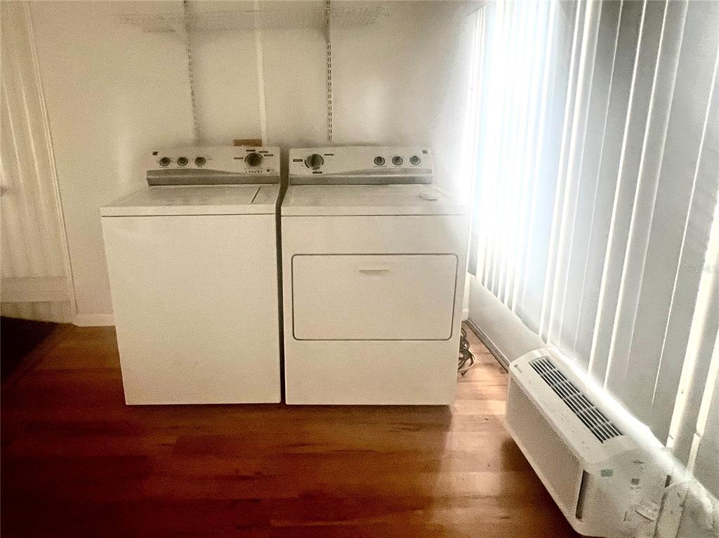 240 Rue De Fontaine Tavares, FL 32778 - Photo 30 of 43 a utility room with dryer and washer