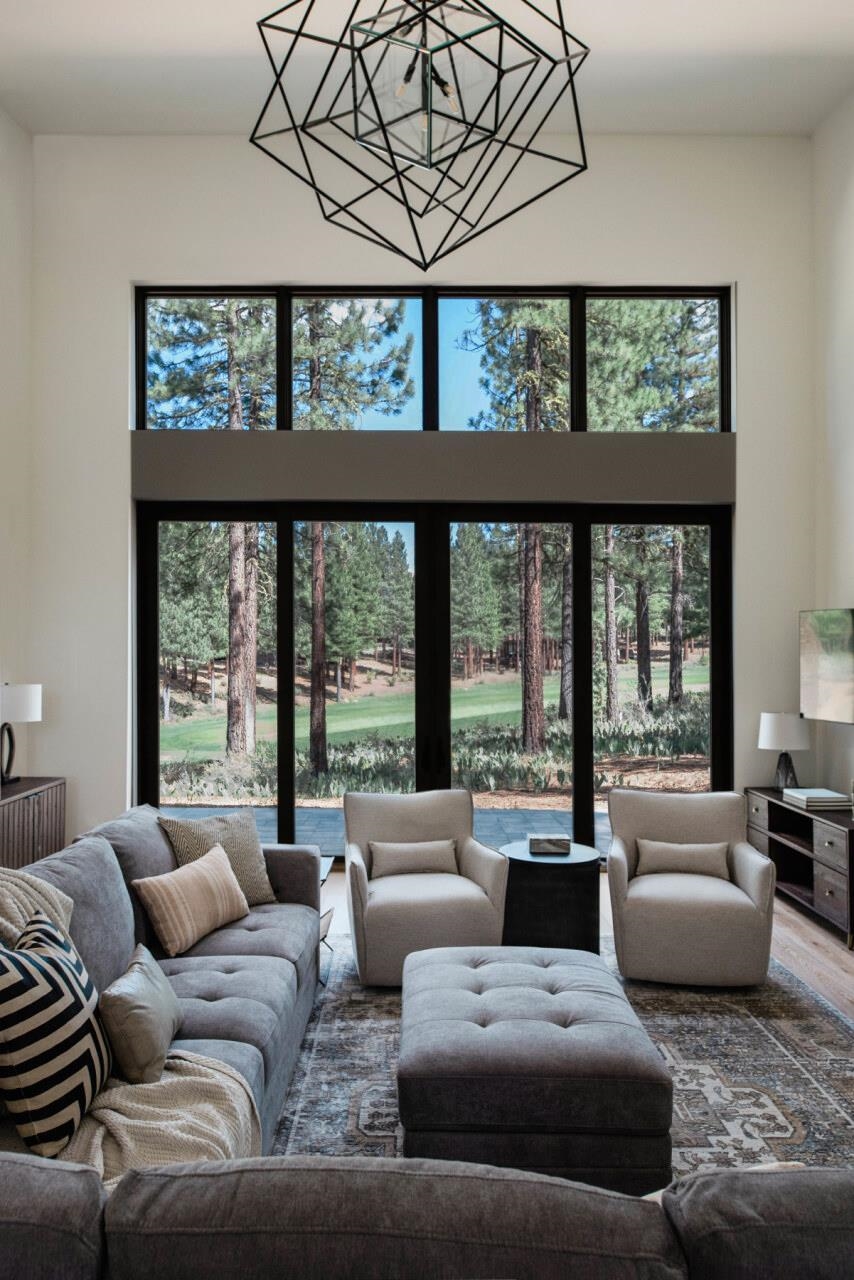 1391 Eagle Feather Portola, CA 96122 - Photo 12 of 28 a living room with furniture and large windows