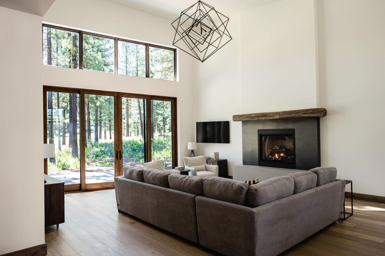 1391 Eagle Feather Portola, CA 96122 - Photo 14 of 28 a living room with furniture and a large window