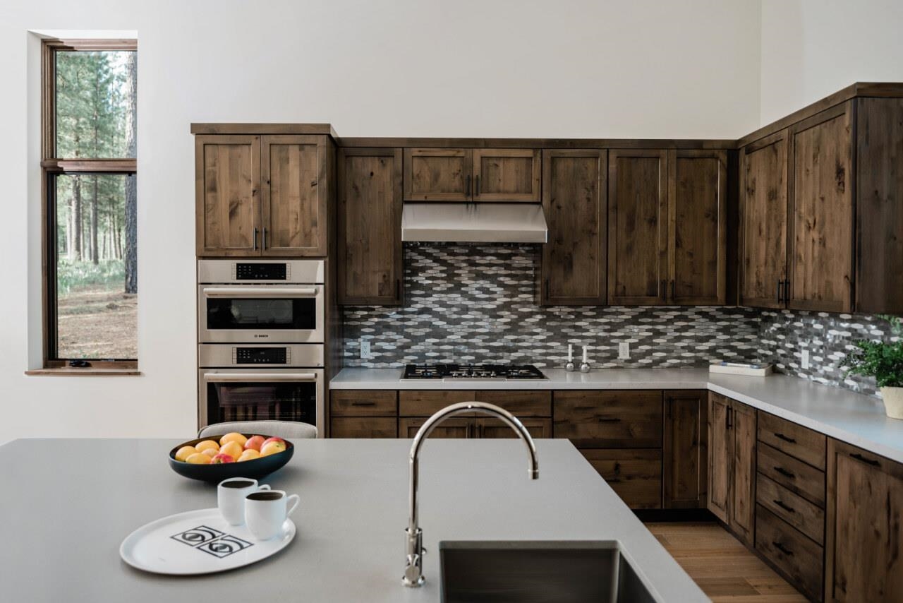 1391 Eagle Feather Portola, CA 96122 - Photo 17 of 28 a kitchen with stainless steel appliances a kitchen island sink microwave and stove