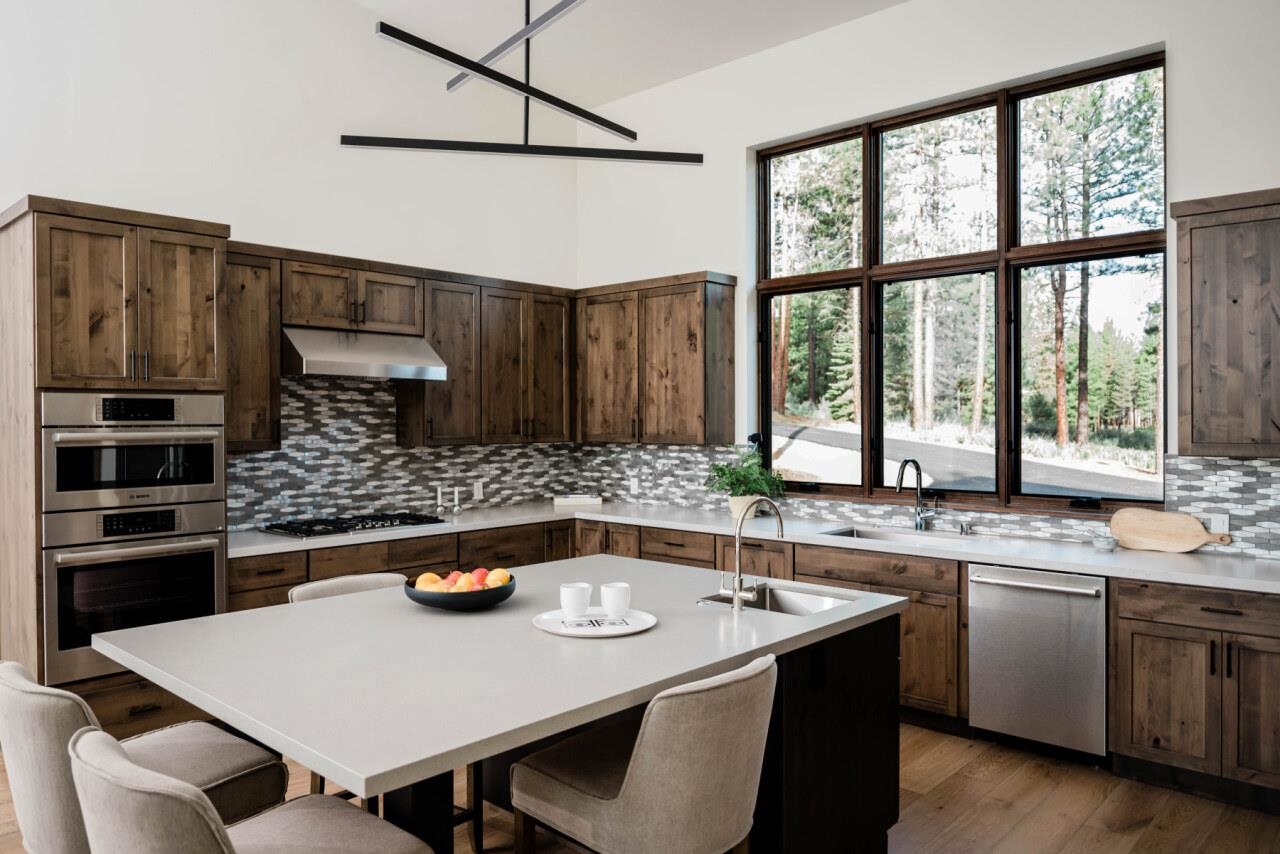 1391 Eagle Feather Portola, CA 96122 - Photo 18 of 28 a kitchen with a stove a sink and a refrigerator