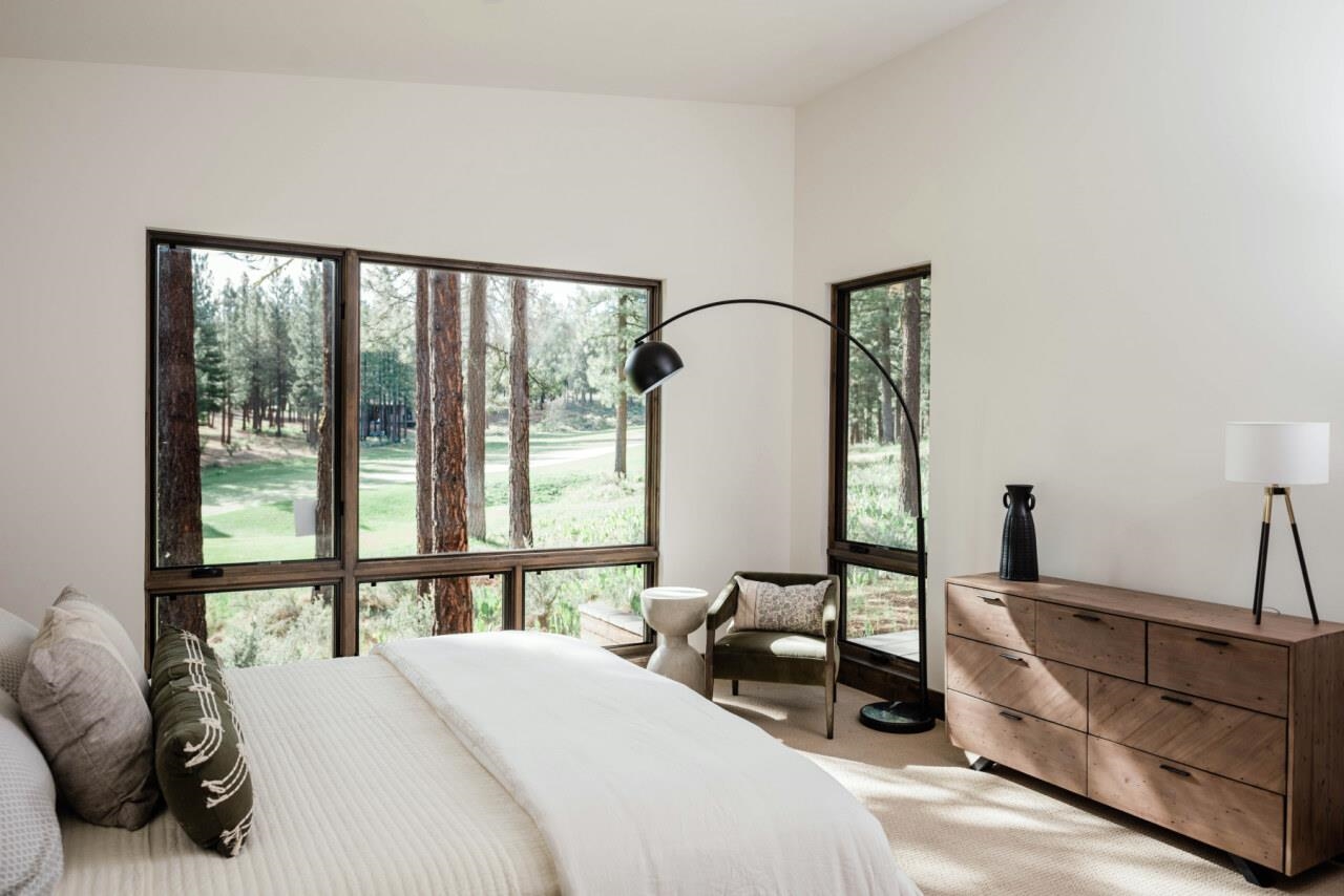 1391 Eagle Feather Portola, CA 96122 - Photo 20 of 28 a bedroom with bed and a large window