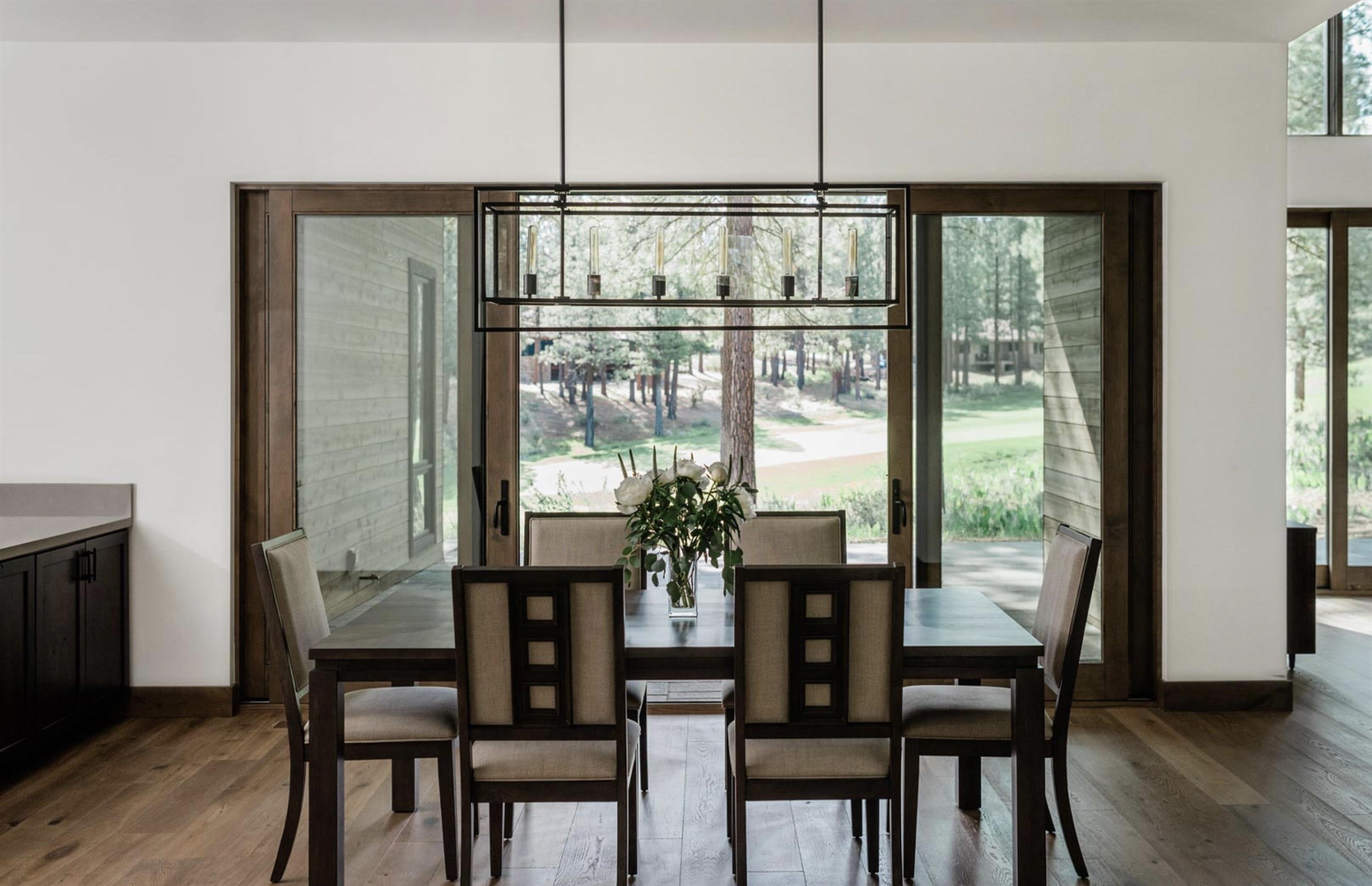 1391 Eagle Feather Portola, CA 96122 - Photo 5 of 28 a view of a dining room with furniture window and wooden floor