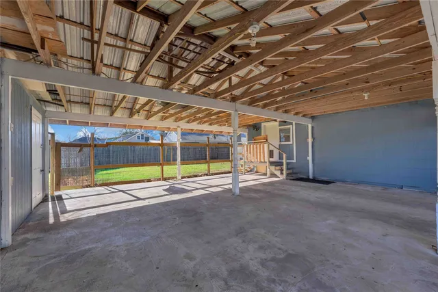 a front view of a house with yard and green space