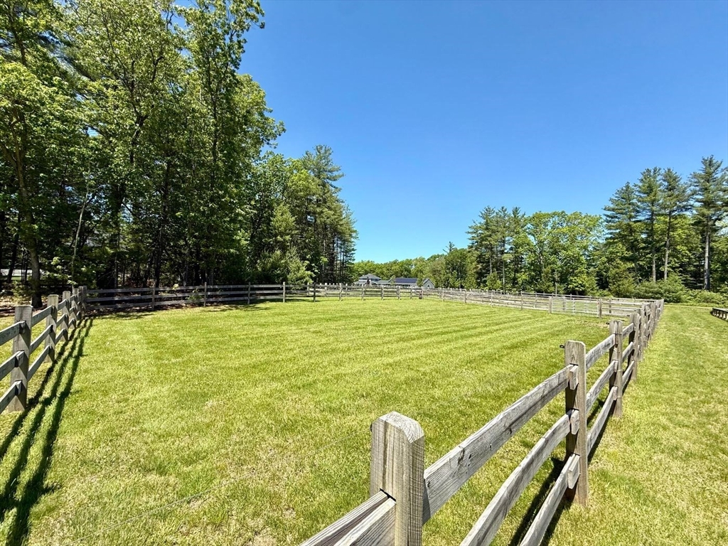 28 Deer Run Road Boxford, MA 01921 - Photo 2 of 12 a view of a swimming pool with a patio