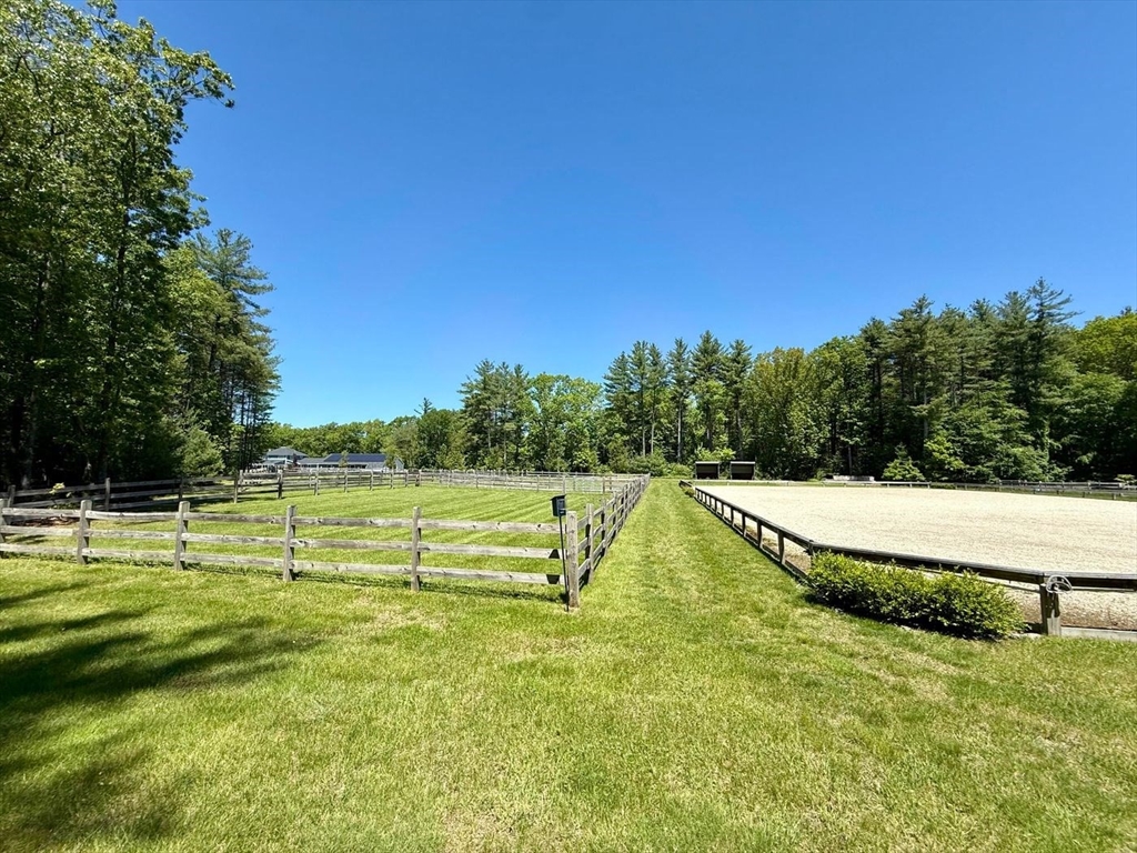 28 Deer Run Road Boxford, MA 01921 - Photo 5 of 12 a view of a swimming pool with a yard