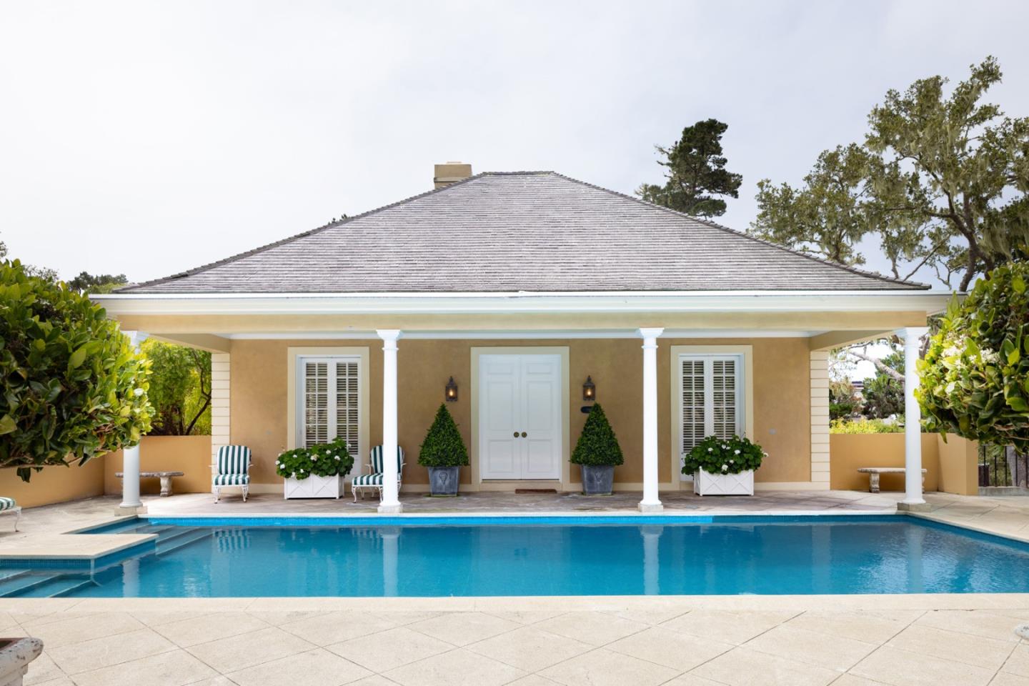 1500 Viscaino Road Pebble Beach, CA 93953 - Photo 11 of 16 a view of a house with sitting area and garden view