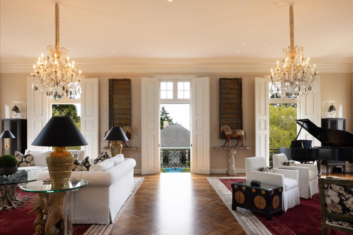 1500 Viscaino Road Pebble Beach, CA 93953 - Photo 3 of 16 a living room with furniture a chandelier and a chandelier