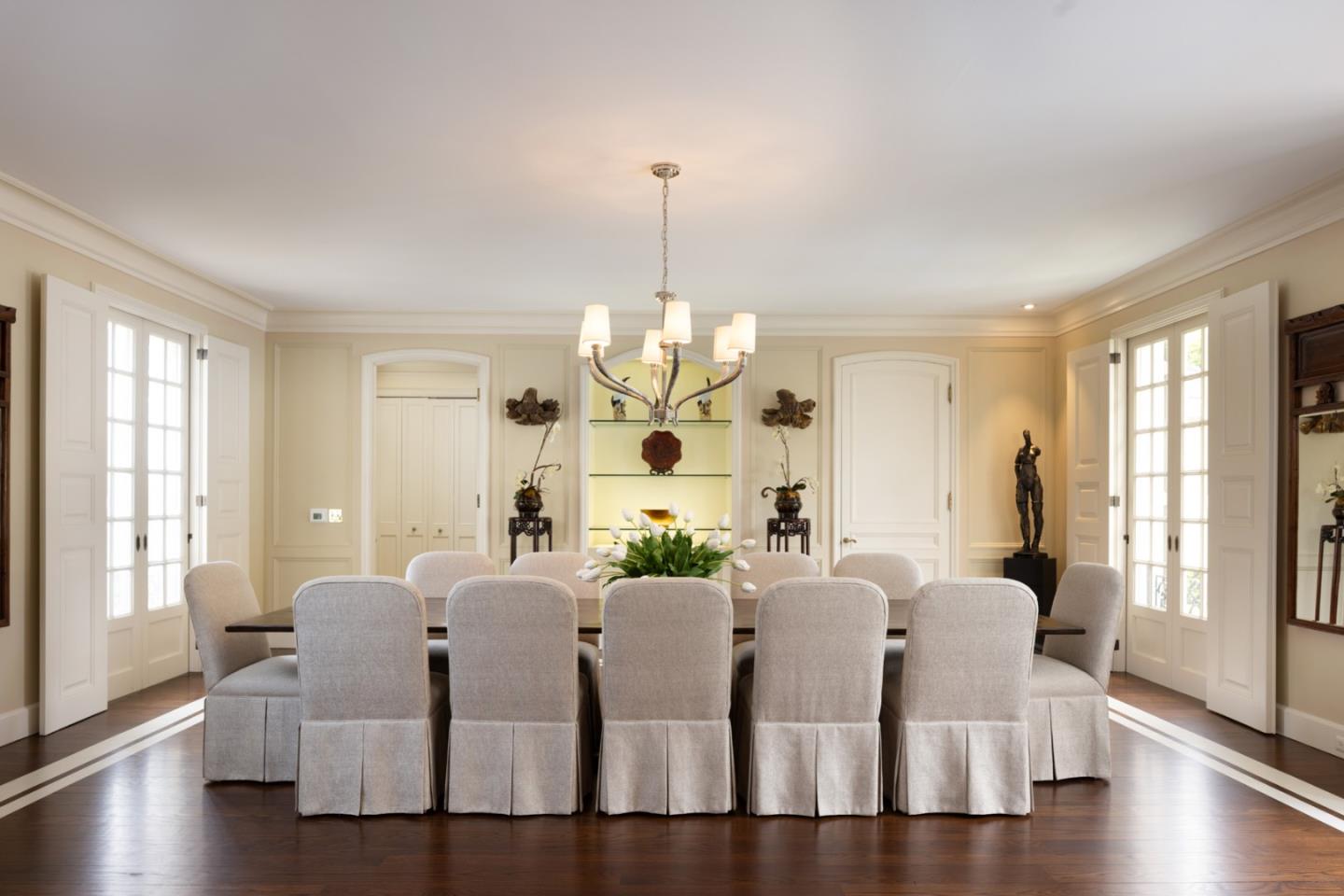 1500 Viscaino Road Pebble Beach, CA 93953 - Photo 5 of 16 a view of a dining room with furniture and wooden floor