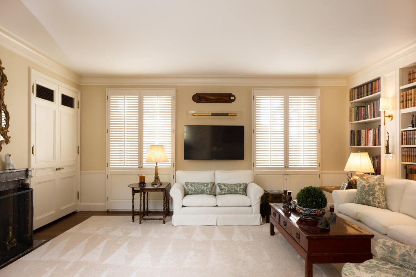 1500 Viscaino Road Pebble Beach, CA 93953 - Photo 6 of 16 a living room with furniture and a flat screen tv