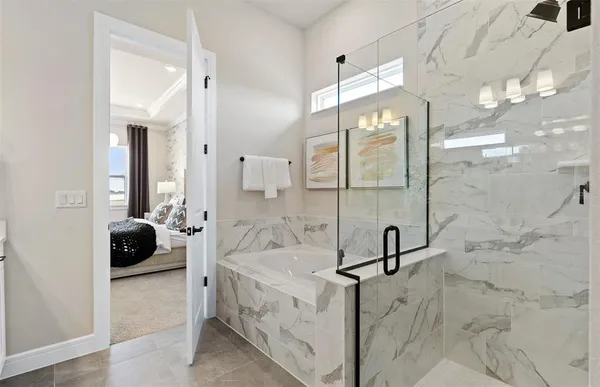 a bathroom with a shower and toilet