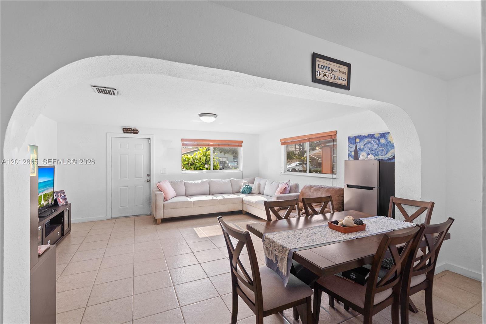 5300 Northwest 30th Place Miami, FL 33142 - Photo 11 of 35 a view of a dining room with furniture