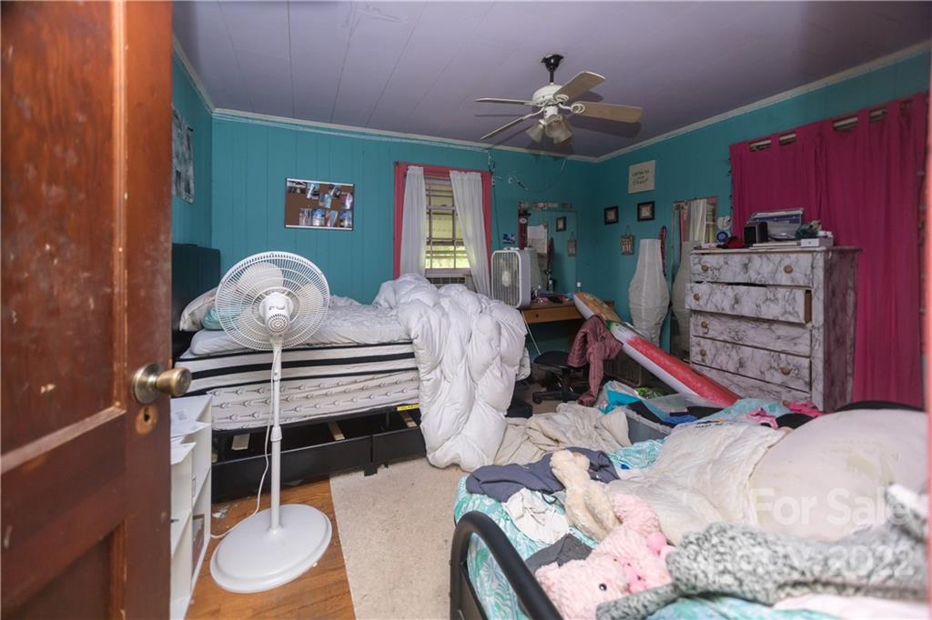 14925 North Old Statesville Road Huntersville, NC 28078 - Photo 15 of 18 a bedroom with furniture and a bed